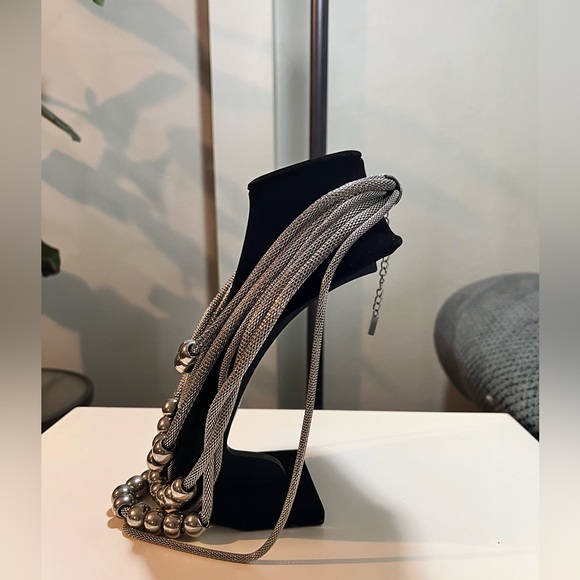 Mika silver-tone signature necklace with 8 stands of mesh chains and silver ball - Picture 3 of 4